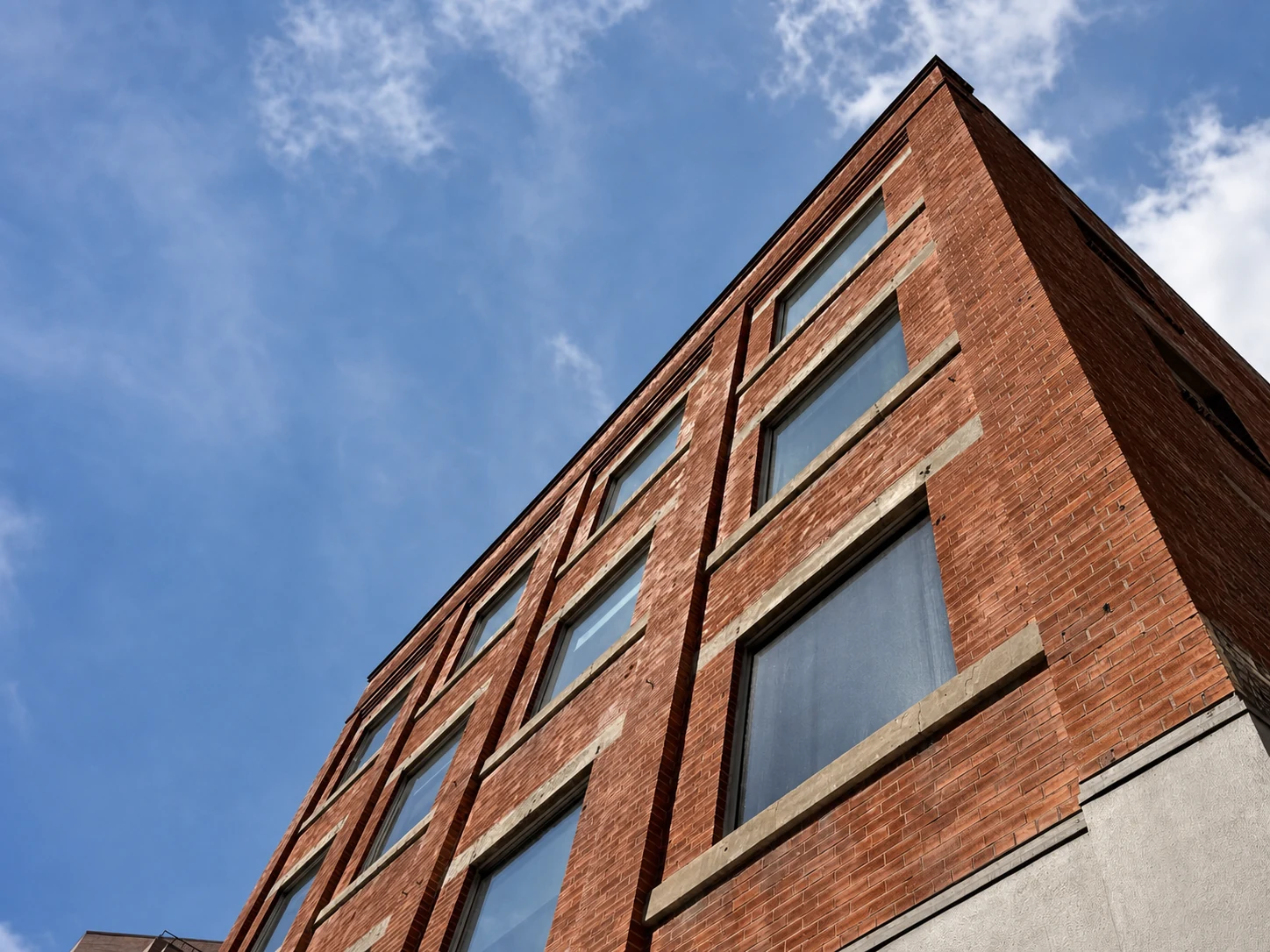 The brick exterior of Work Nicer Westcoast